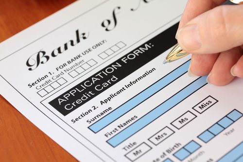 Person filing out a credit card application